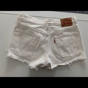 Levi’s white high-waisted denim shorts- 26 waist